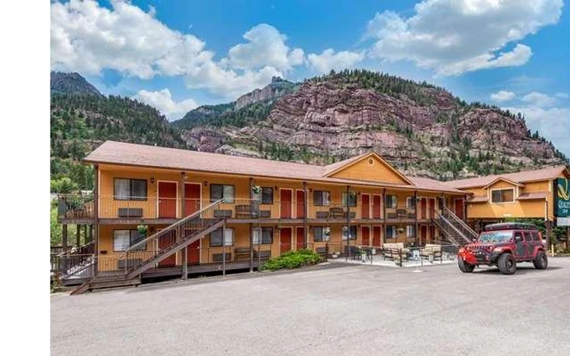 Quality Inn Ouray with mountain backdrop near the Ouray hot springs pool, Colorado